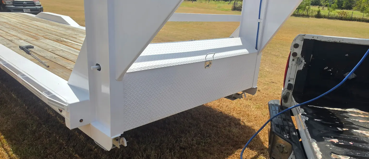 After: the same trailer front, clean white