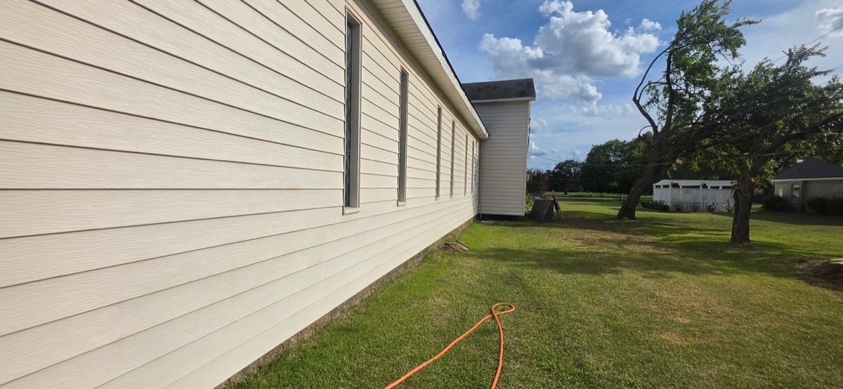Clean exterior wall after pressure washing