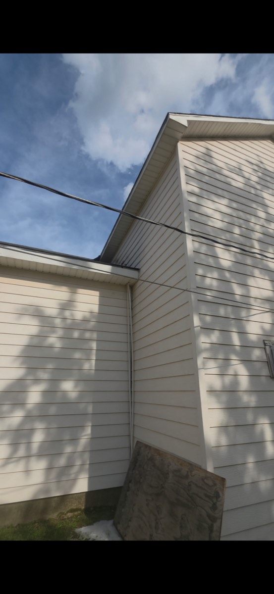 Clean gable end after pressure washing